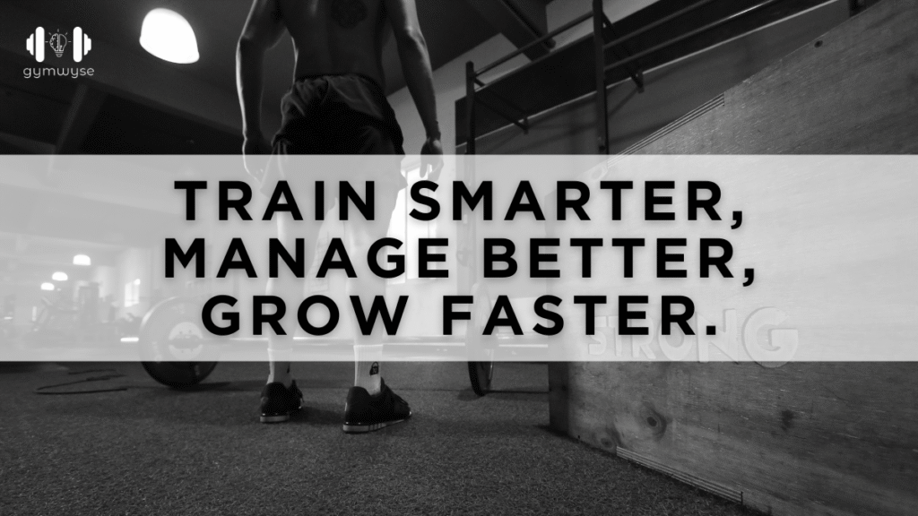 Personal trainer using workout software on laptop with GymWyse dashboard